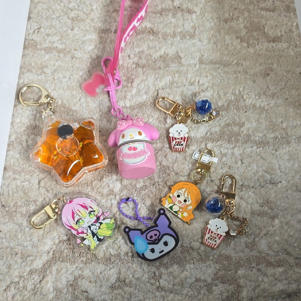 Cute Character Keychain Set with Pink and Gold Accents